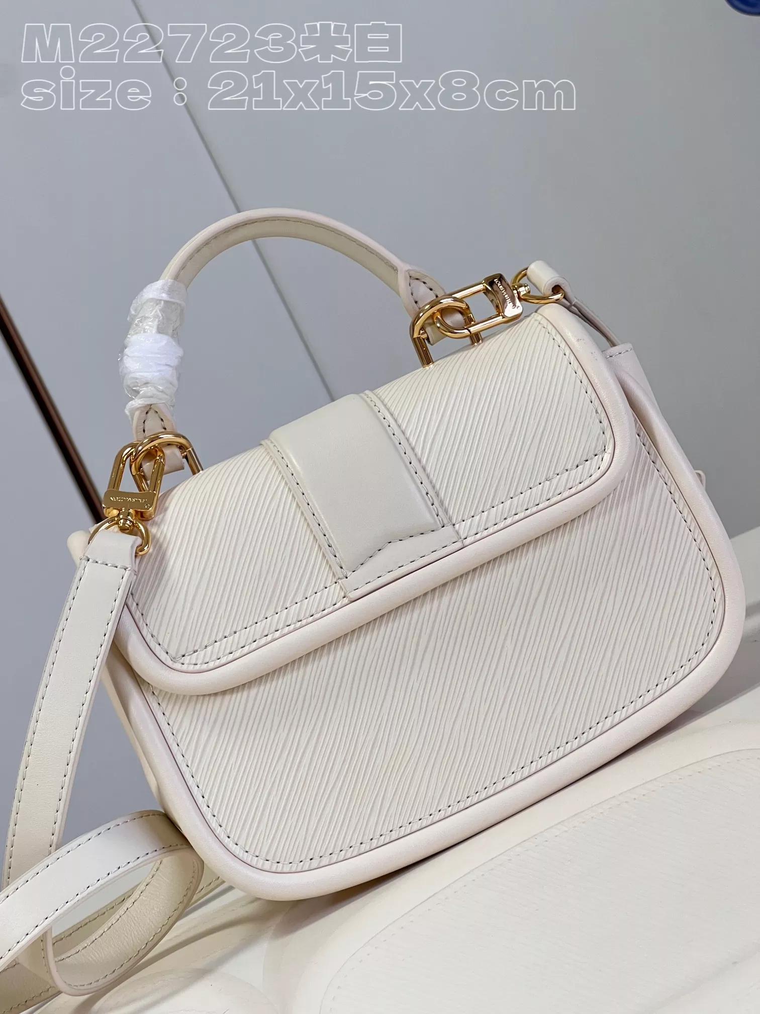 LV Hide and Seek Epi Cream - ReplicaBags.is - Image 6